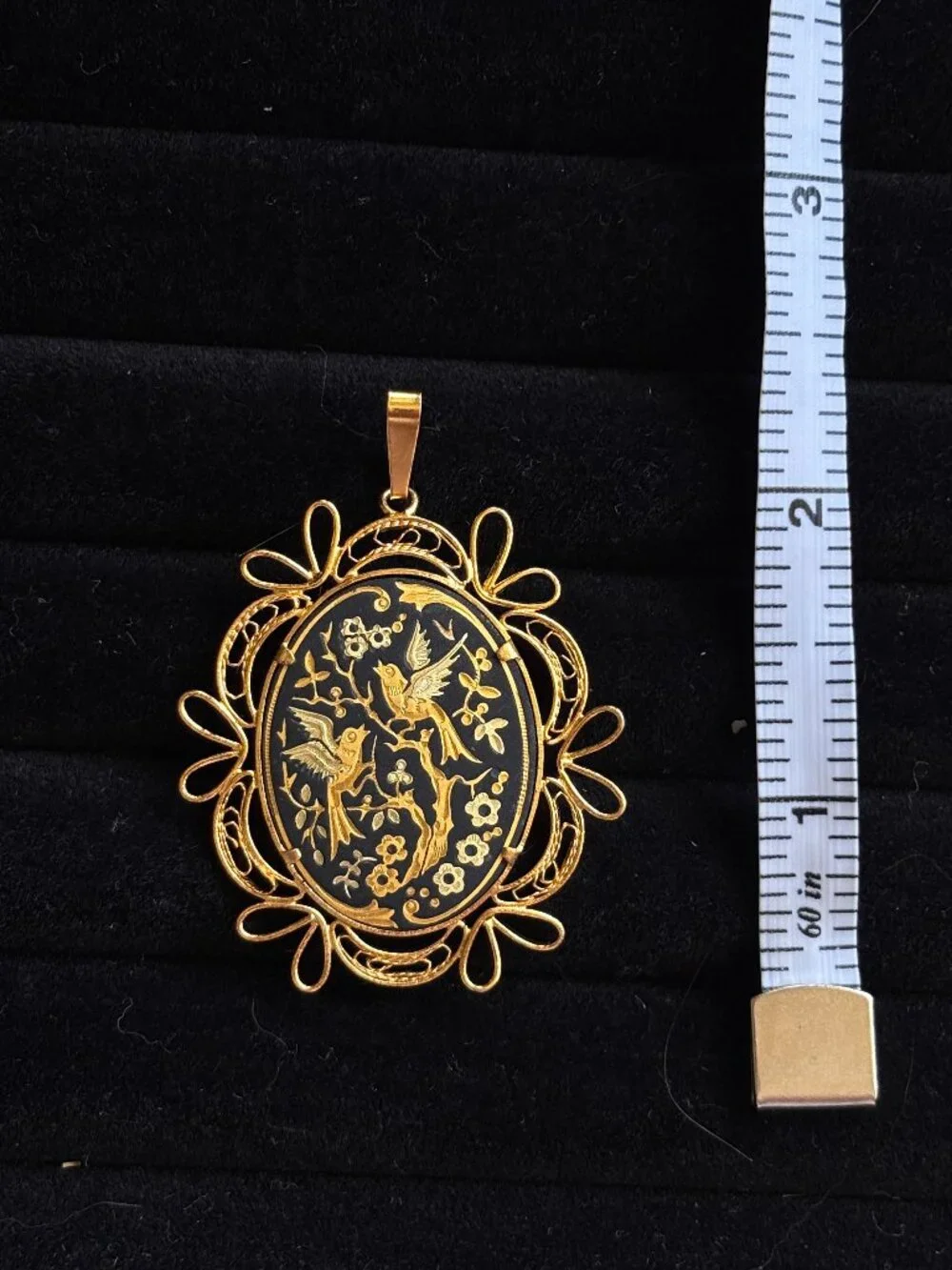 Vintage damascene bird pendant